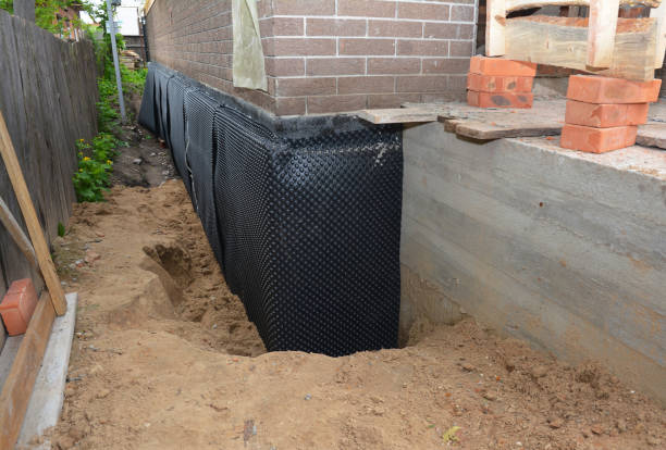 SJ Waterproofing Pros technician performing targeted Waterproofing assessment in Zenda, KS